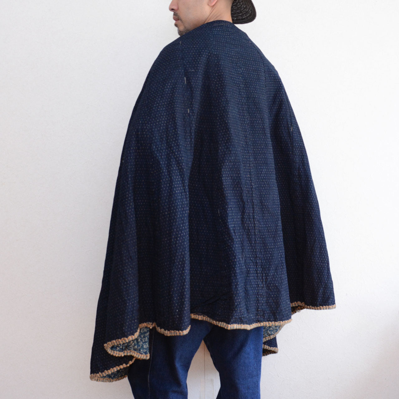 A vintage Japanese dochu kappa crafted from indigo-dyed cotton.