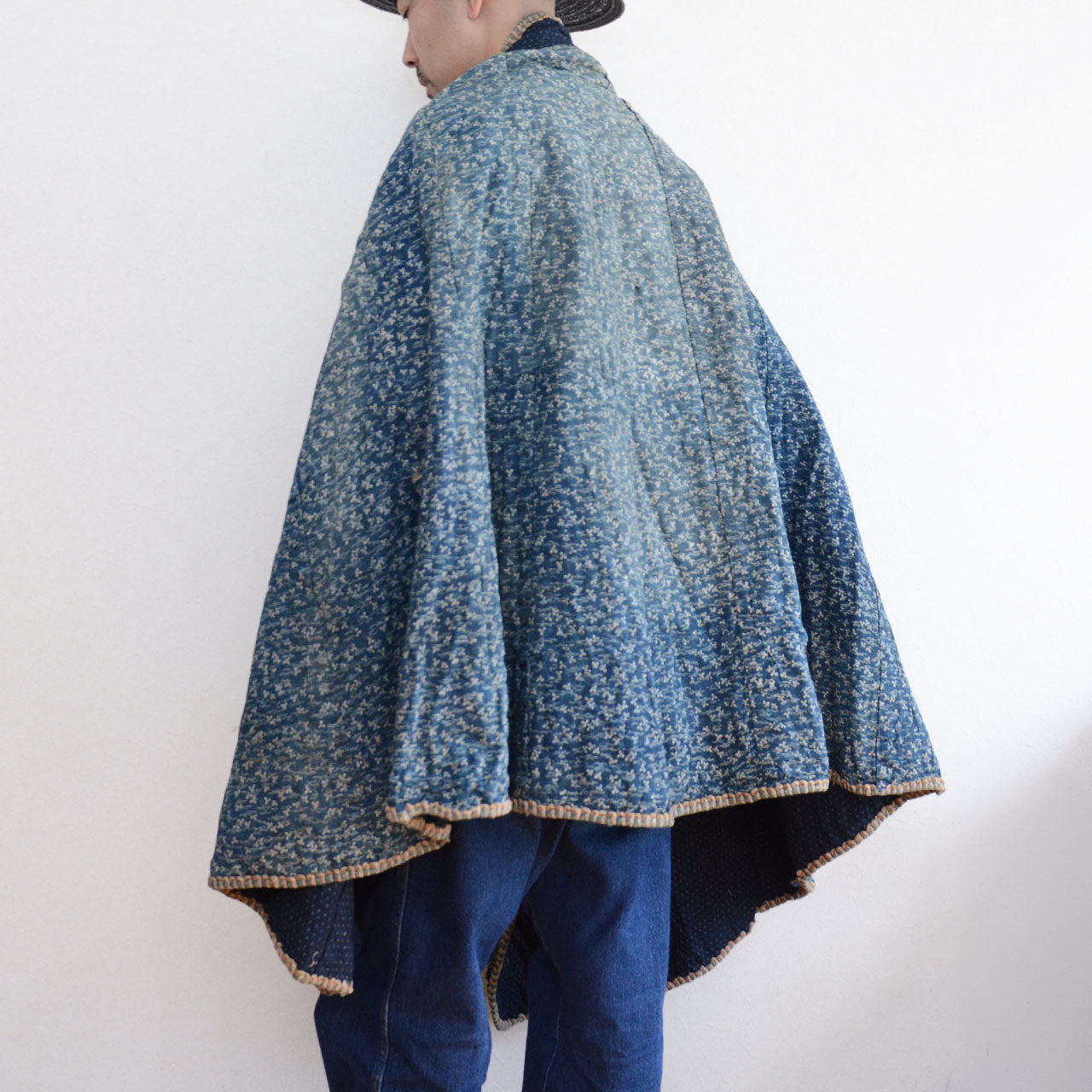 A rare Japanese indigo-dyed dochu kappa from the Meiji period.