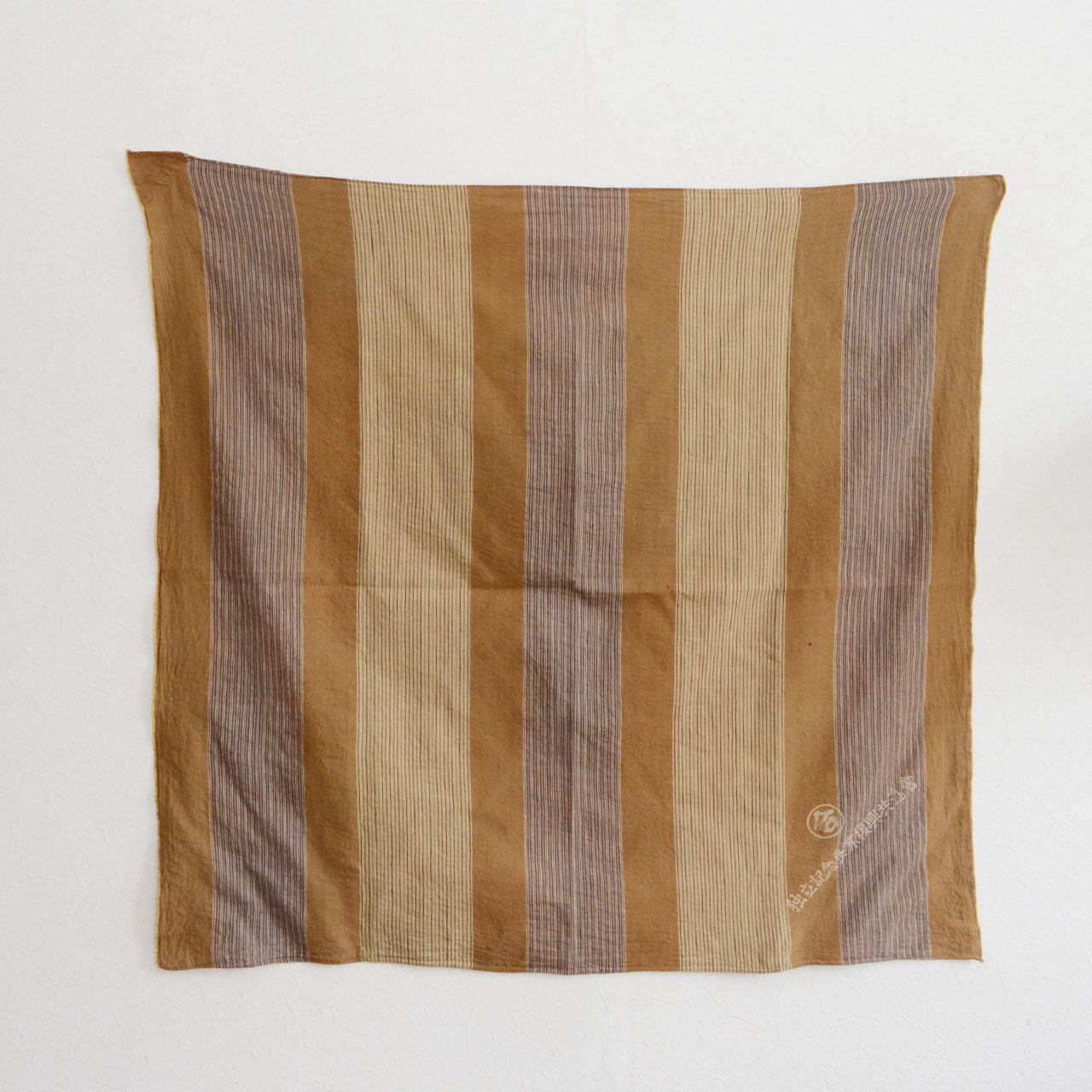 Antique Japanese fabric with natural fading and time-worn texture