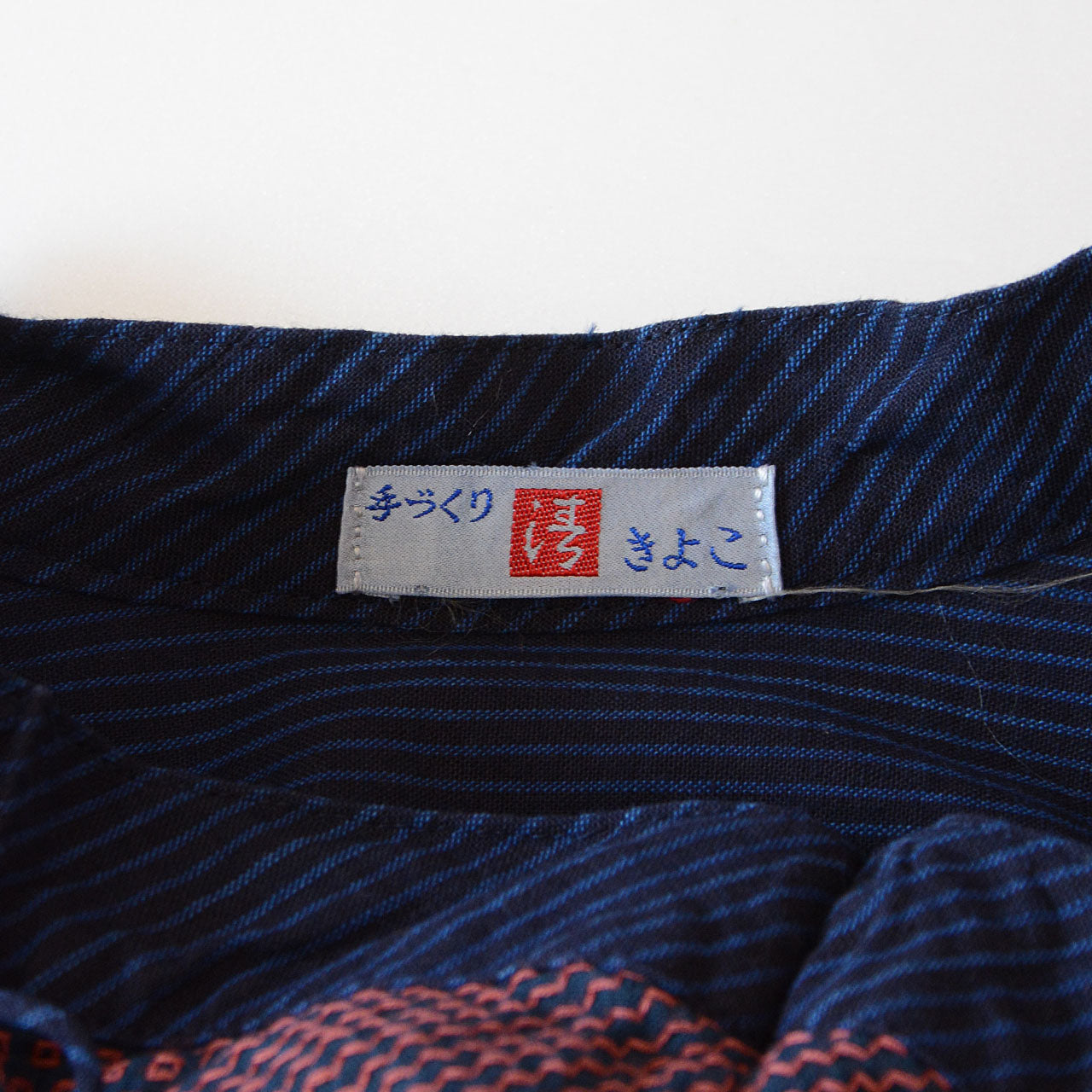 Handmade blouse highlighting subtle sashiko-inspired craftsmanship