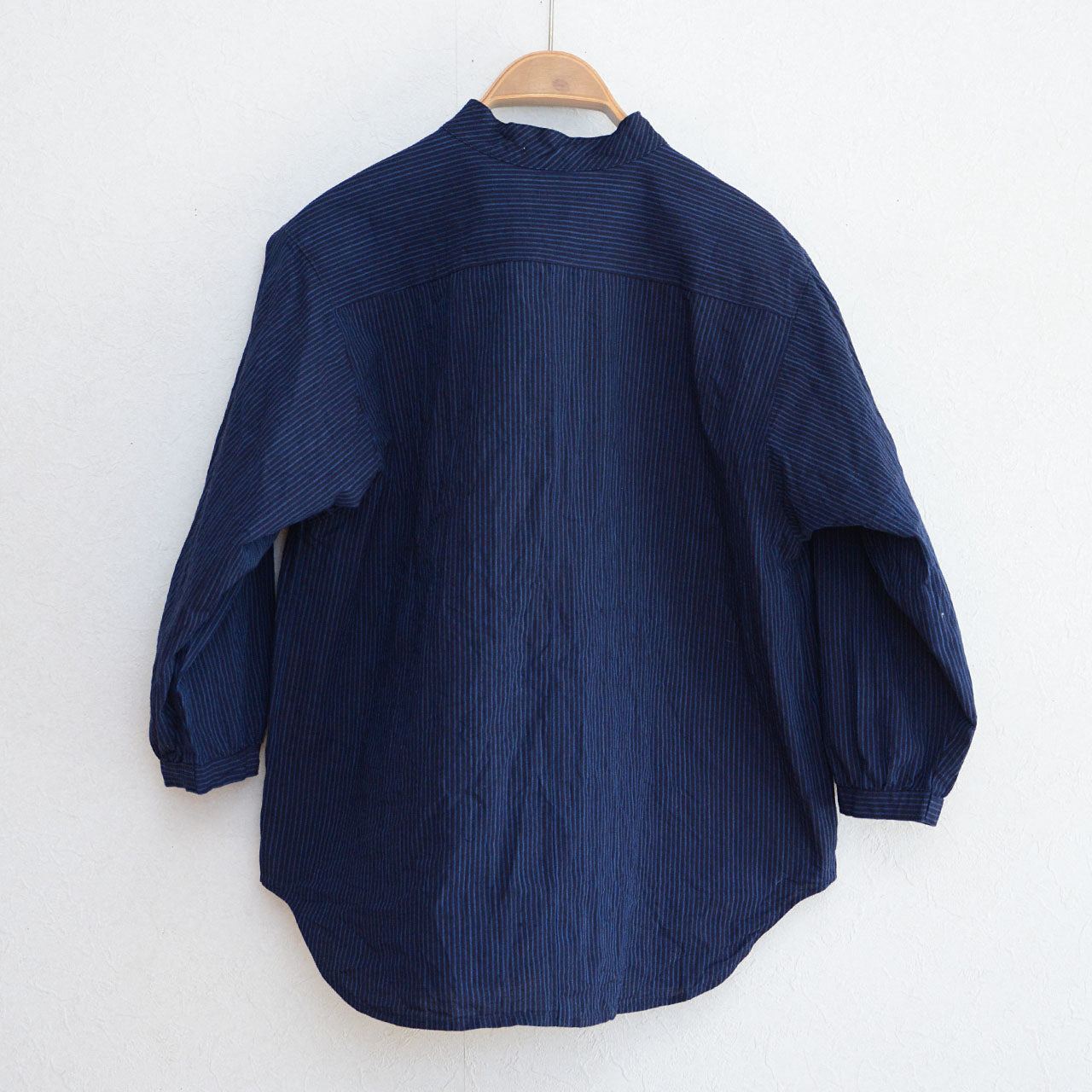 Japanese handmade blouse featuring sashiko-inspired fabric accents