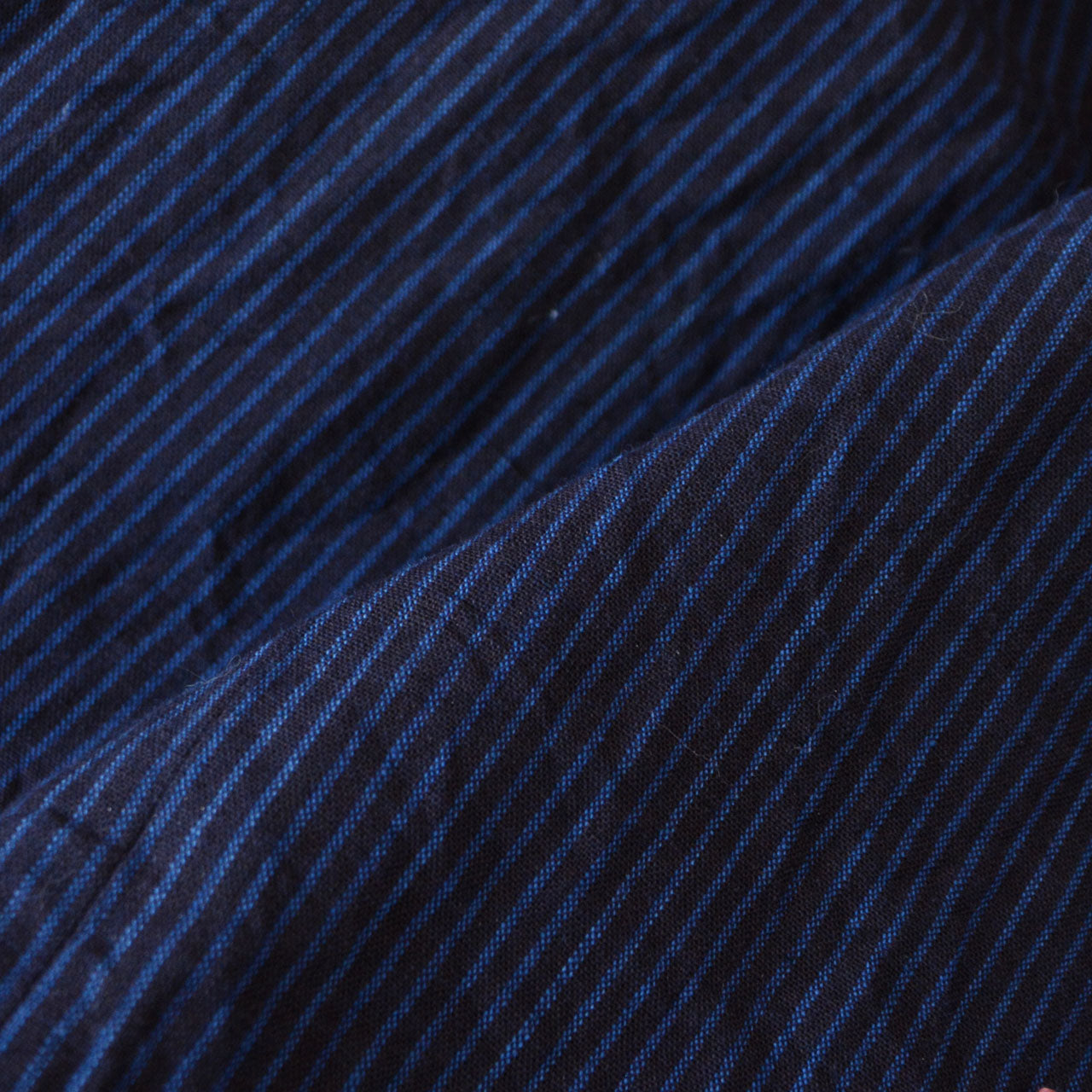 Striped cotton blouse by Tezukuri Kiyoko with a simple, timeless design