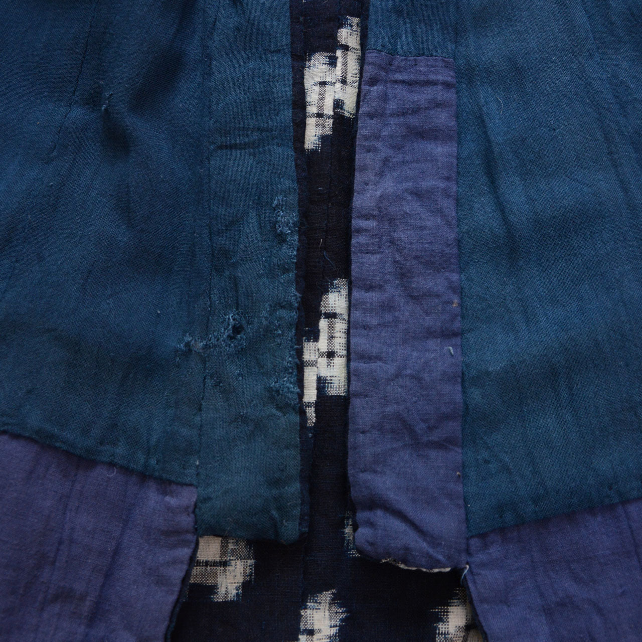 Close-up of front placket fraying and wear, vintage hanten padded jacket