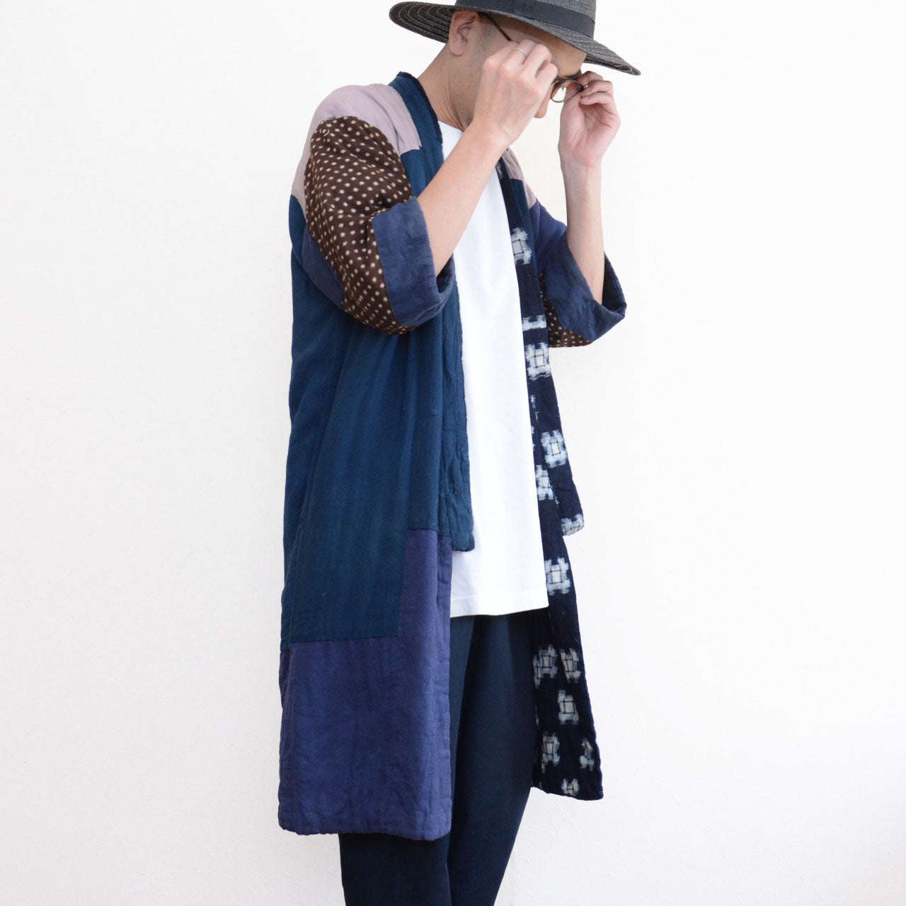 Model wearing vintage Japanese hanten padded jacket open, front view, white tee and navy bottoms, height 171cm