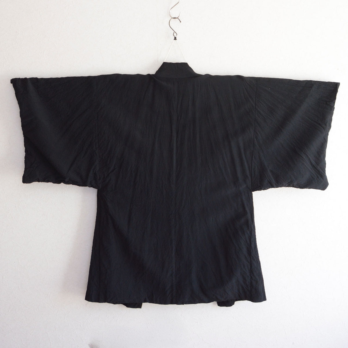 1970s–1980s men's black Japanese vintage haori jacket with a center seam and wide sleeves