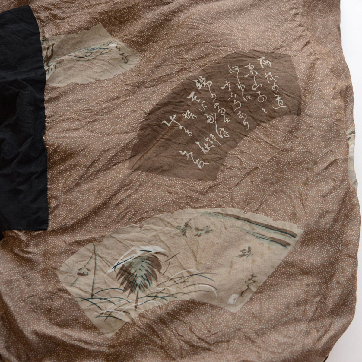 Brown and beige lining with Japanese calligraphy, grasses, and fine white dots on a vintage men's haori jacket