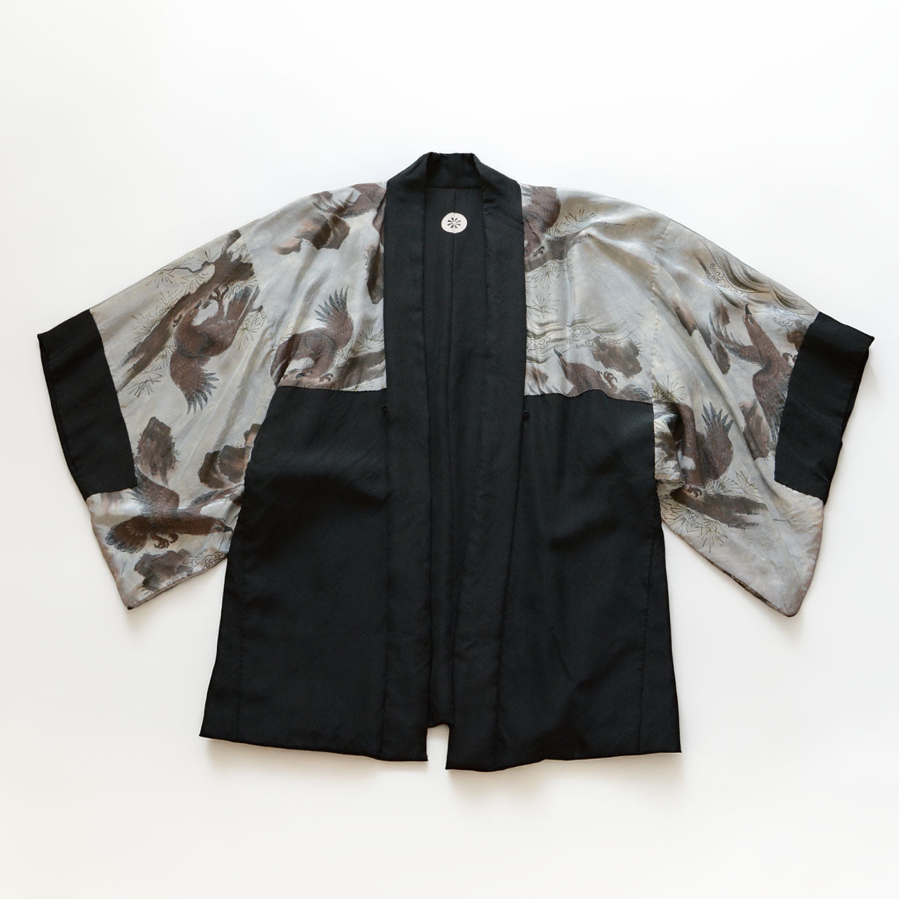 Lining of black silk haori turned inside out, full eagle and pine motif visible, taka-matsu-zu on silver-grey silk, Japan vintage