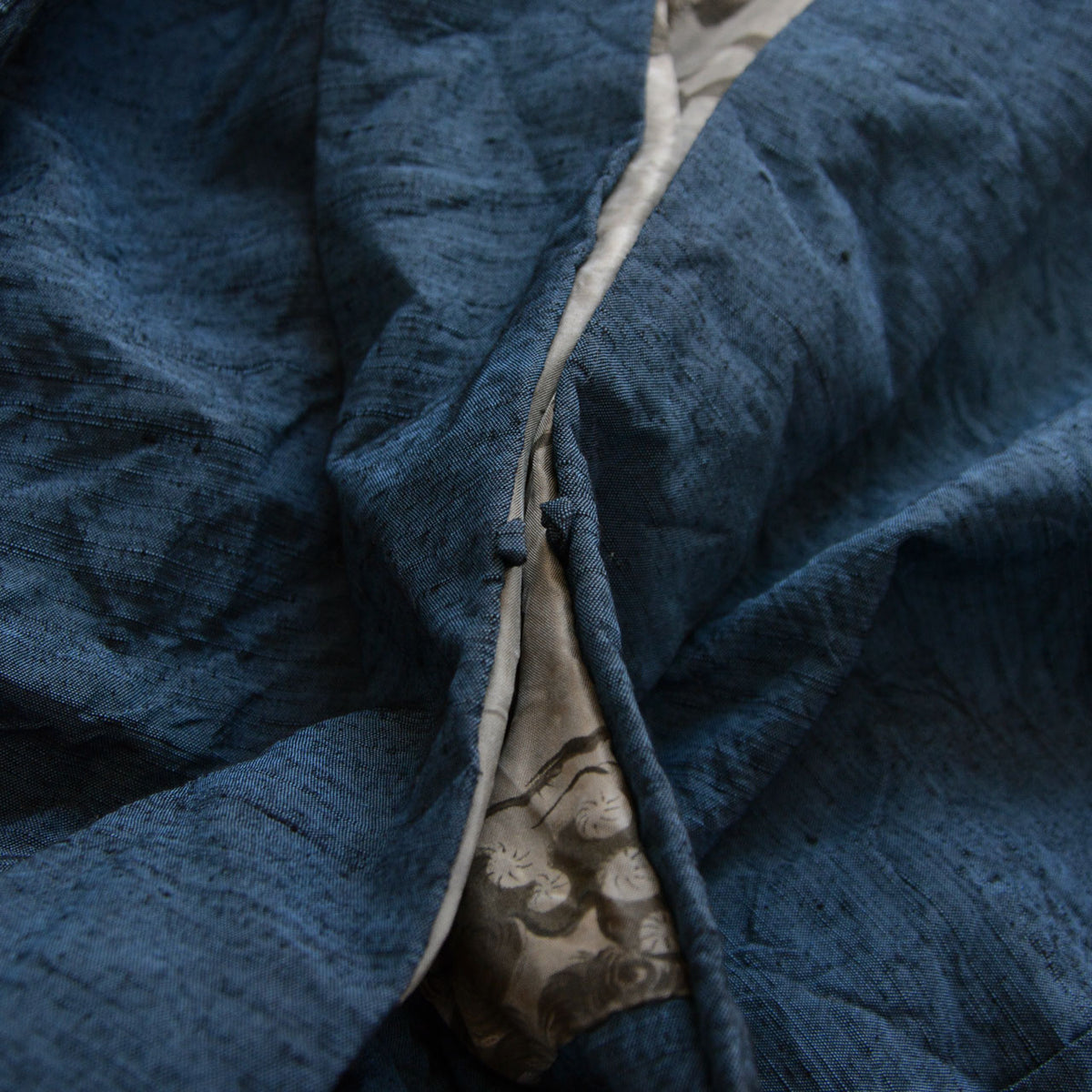 Blue fabric attachment loops for haori ties on a men’s vintage haori jacket