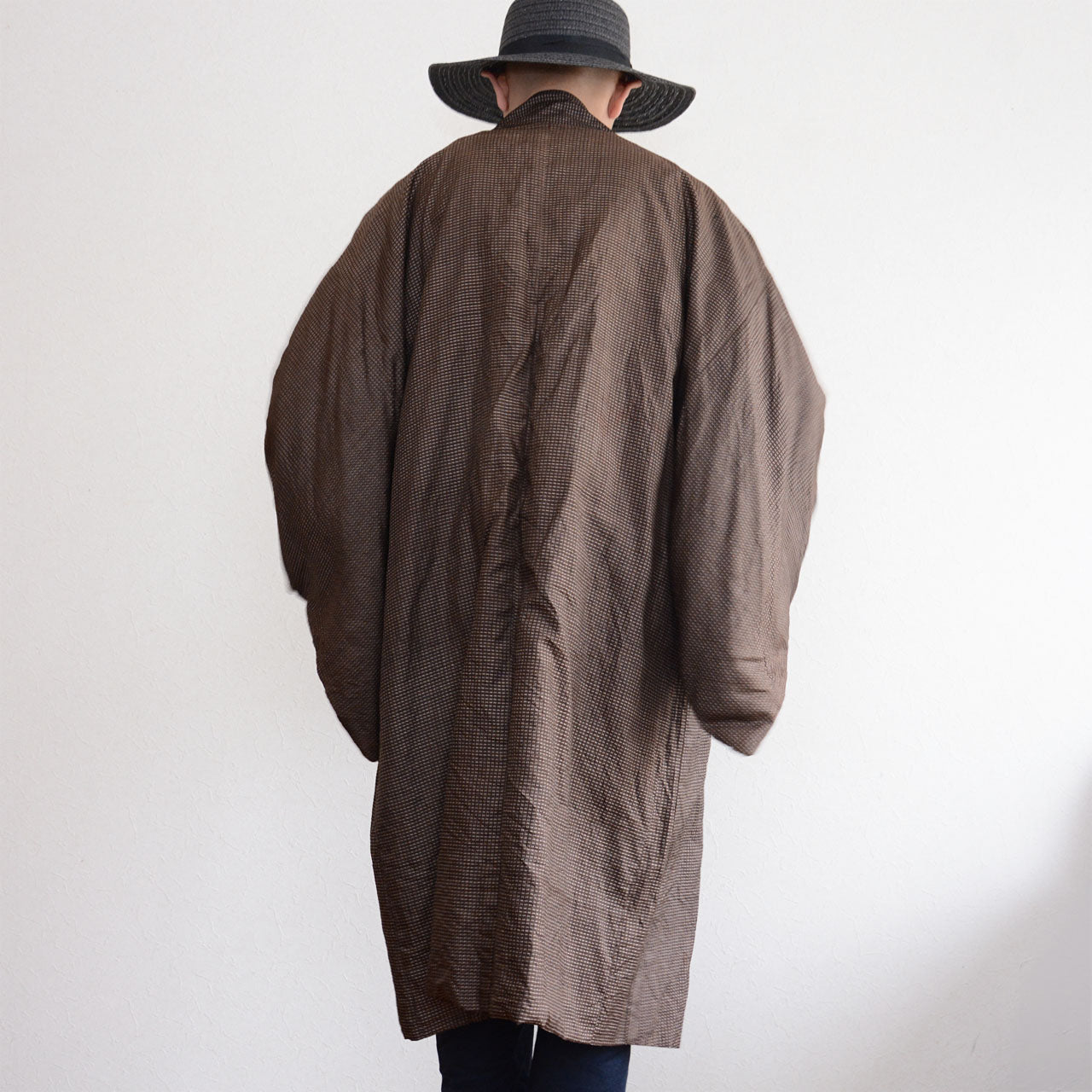 Men's Japanese vintage haori jacket in brown silk komon, back view showing full length silhouette, Showa era