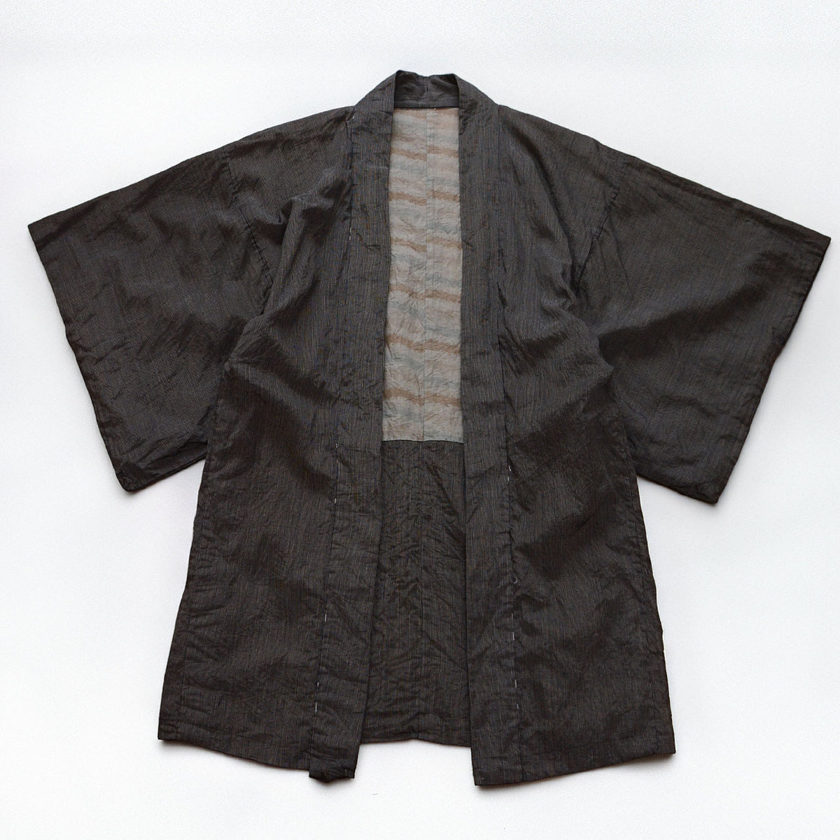 Early–mid Showa men’s long haori with fine grey-white stripes and muted patterned cotton lining