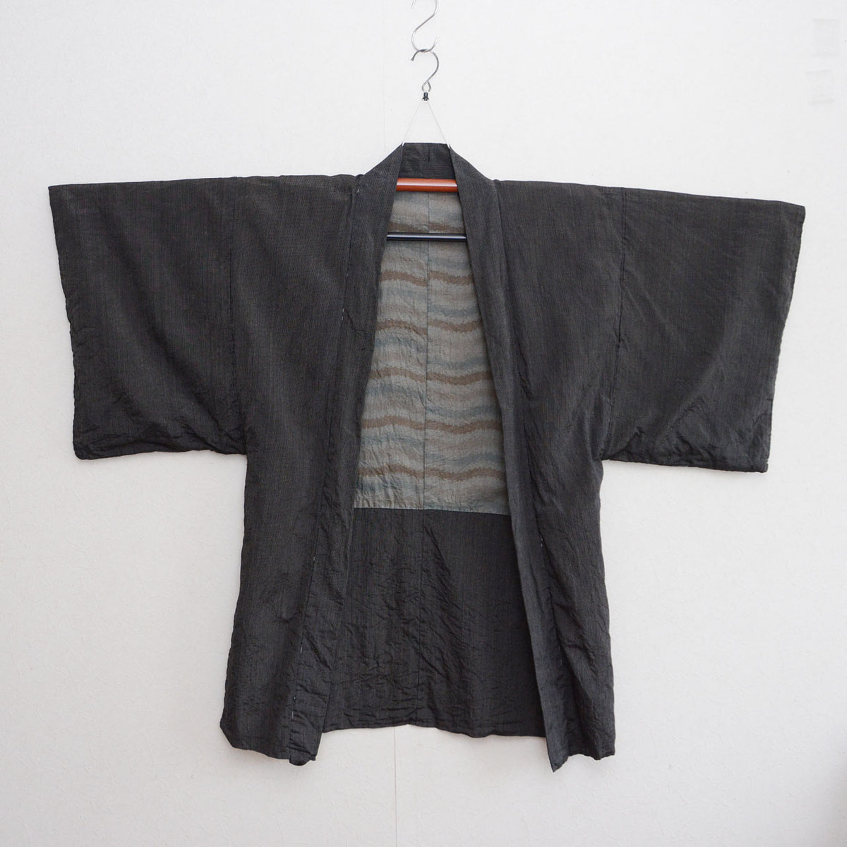 Vintage men’s long haori in a deep black-to-charcoal-like tone with fine stripes