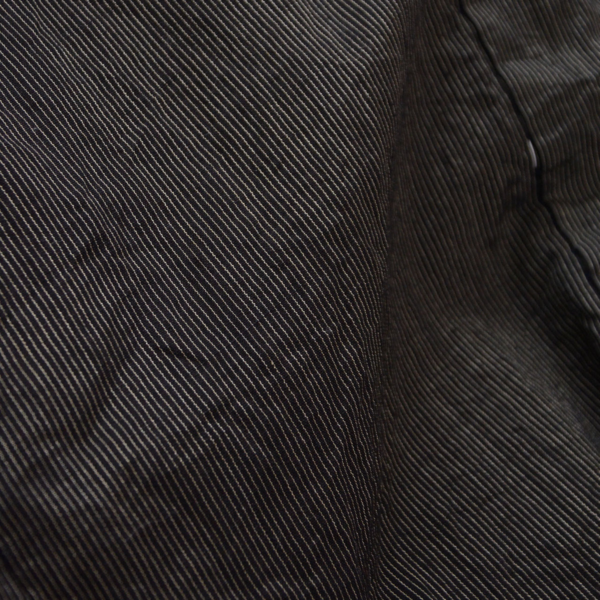 Fine grey-white stripes and textured fabric of a vintage Japanese haori