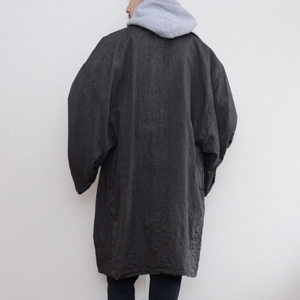 Long silhouette and generous sleeves of a vintage haori with a grey hoodie