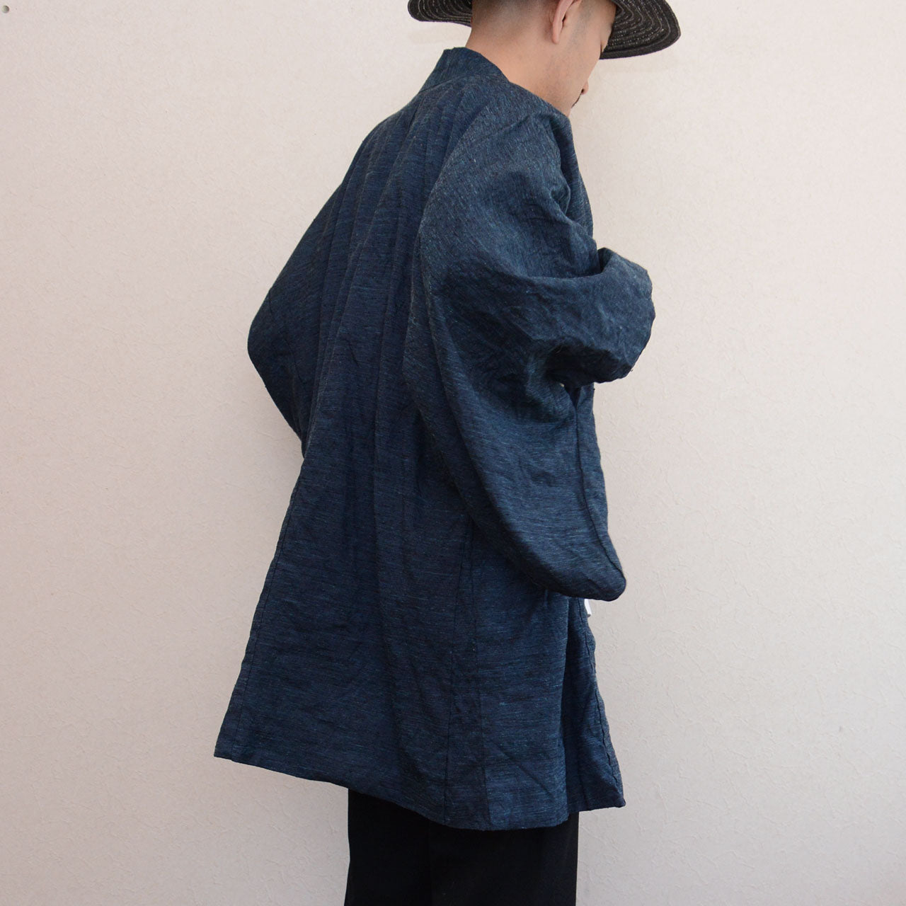 Deep blue haori jacket fabric, woven texture with natural fiber variation