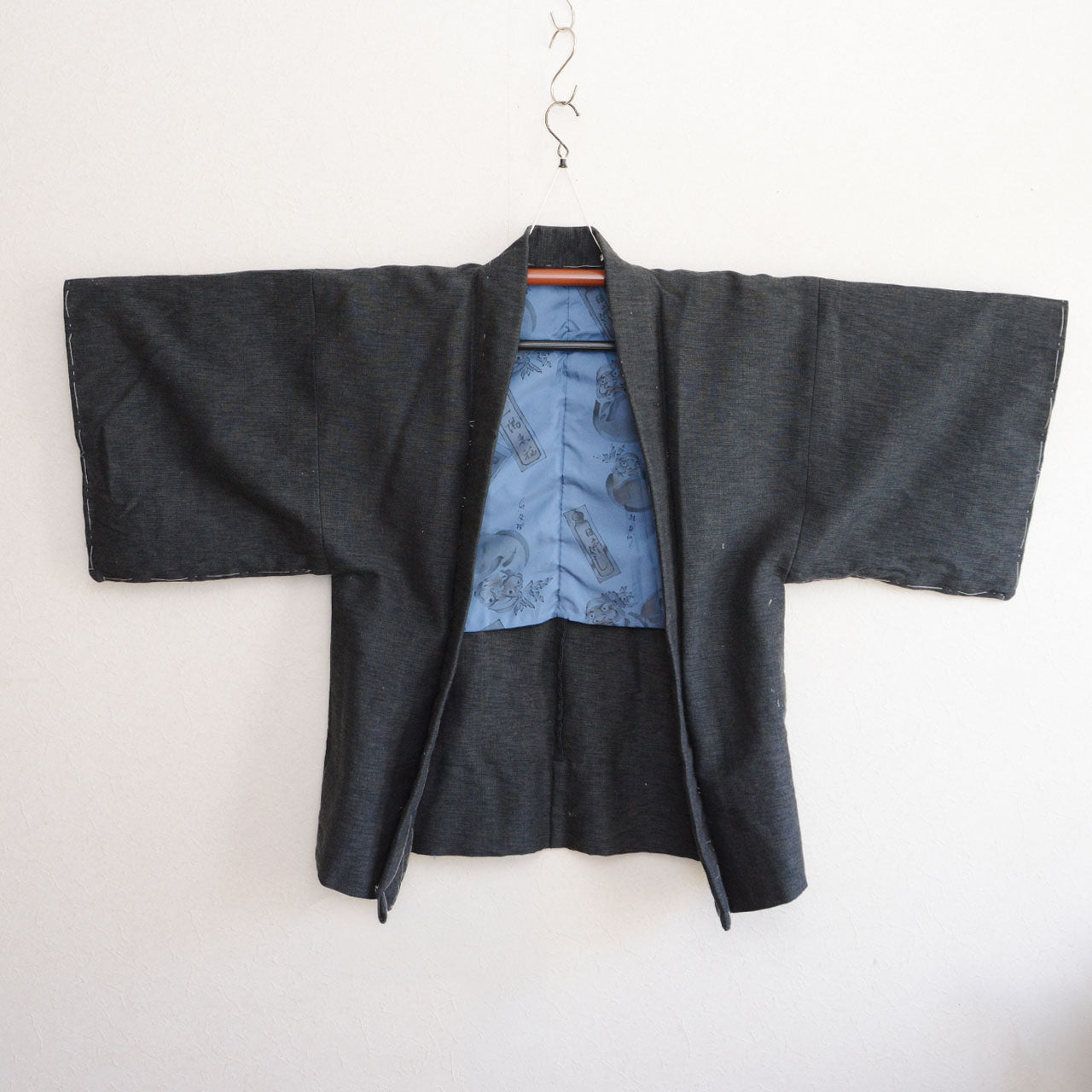 Vintage Japanese wool haori, blue lining with daruma figures, deadstock condition, 1970s–80s
