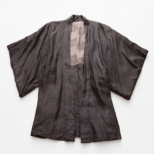Vintage haori jacket, front view, laid flat, komon pattern on dark silk blend fabric, Japan 1970s–80s