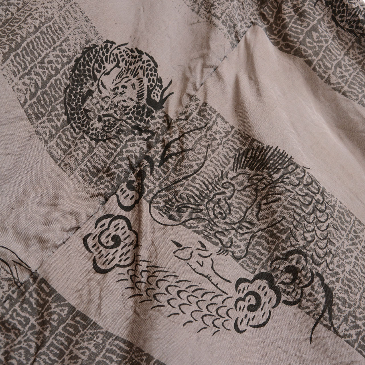 Dragon lining of vintage haori jacket, dragon head detail with cloud motif, printed on beige fabric, Japan vintage
