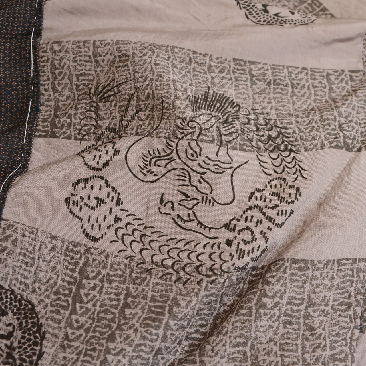 Dragon lining of vintage haori jacket, full dragon figure with wave and cloud pattern, printed on beige fabric, Japan vintage
