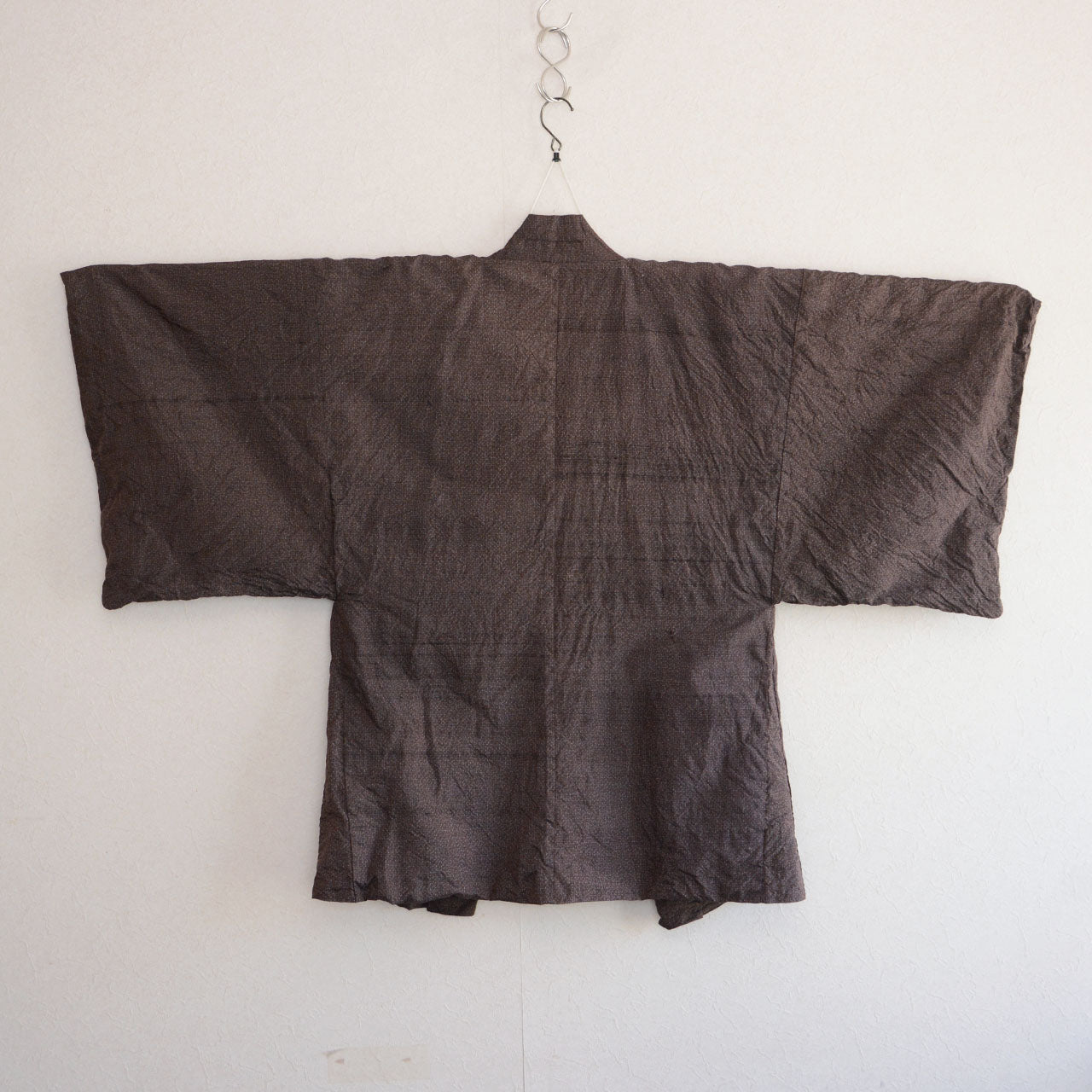 Men's vintage Japanese haori jacket in dark brown woven fabric — back view, wide sleeves, 1970s–1980s Japan