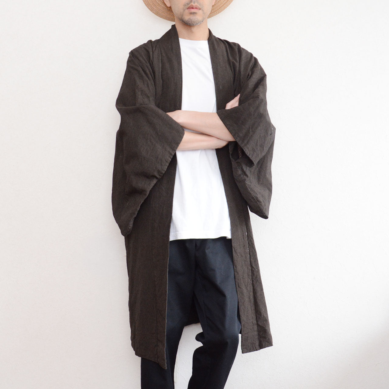 Long haori jacket worn by male model, arms crossed, stripe cotton, Japan vintage, front view