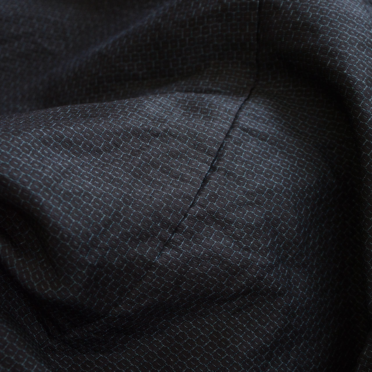 Artist's seal and signature on haori lining, red kakan stamp