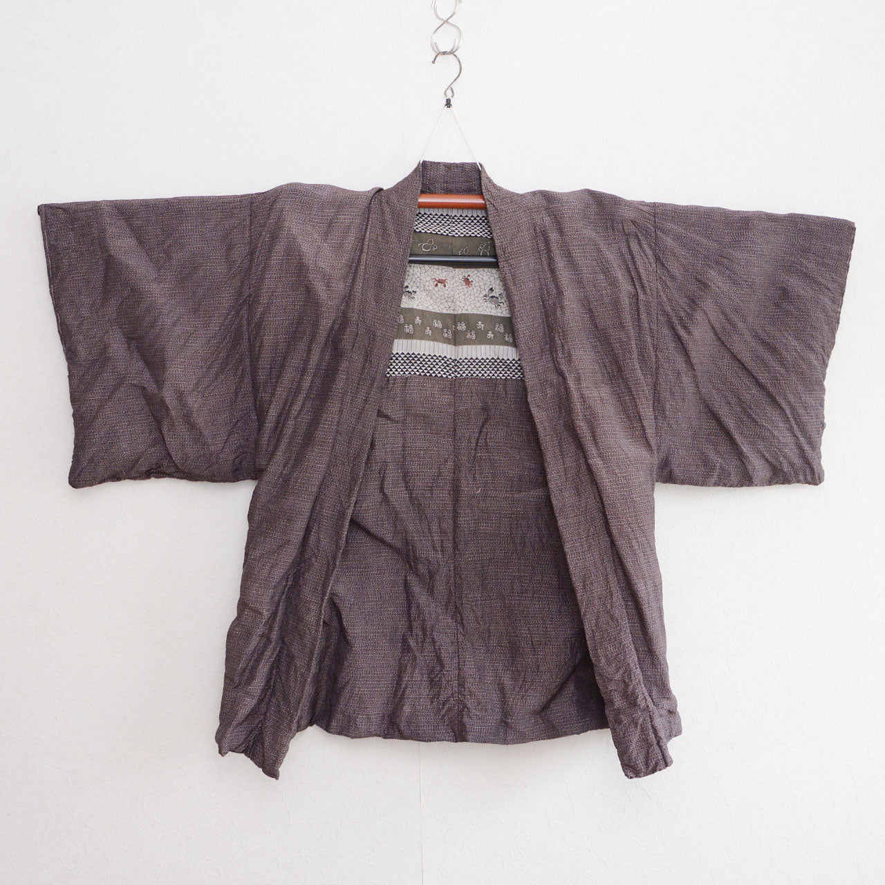 Haori jacket, rayon blend, understated tone outer fabric, on kimono hanger, front view