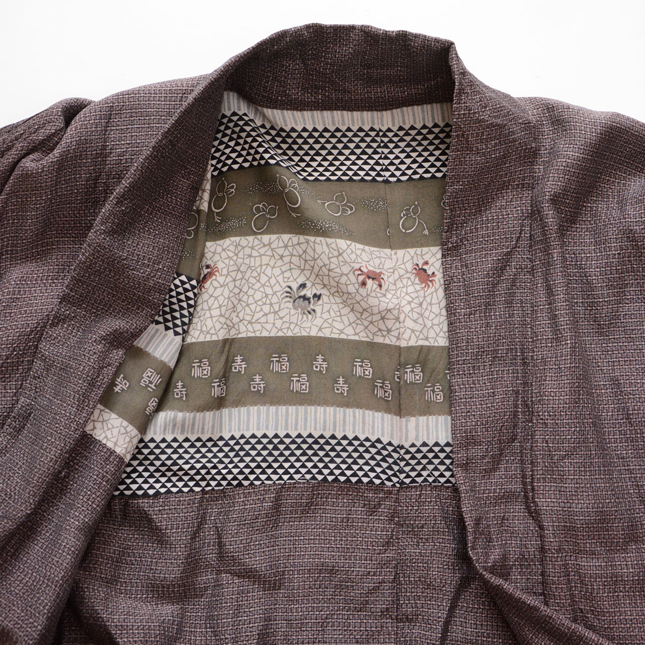 Haori jacket lining visible through collar opening, gourd and crab auspicious motif, horizontal band pattern