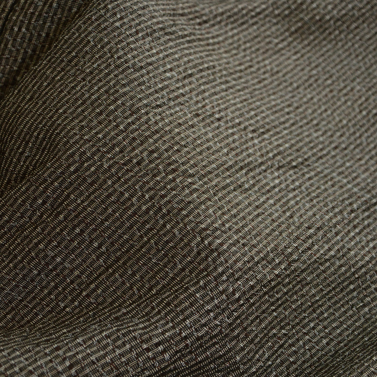 Fine-patterned fabric in muted brown and gray tones on a Japanese vintage haori jacket
