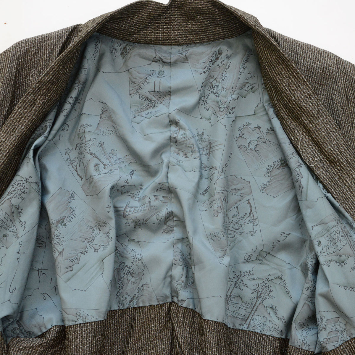 Blue-gray haori lining with Japanese landscape scenes and calligraphy