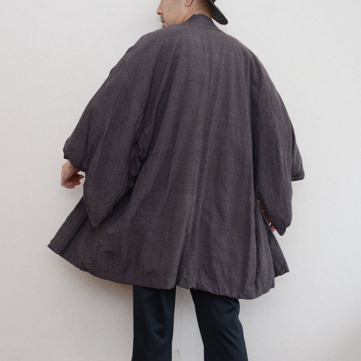 Japanese vintage men's haori worn by a model, back view, late Showa era