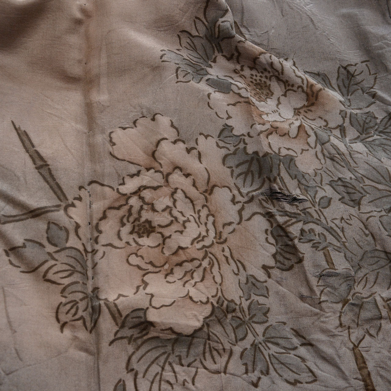 Worn Japanese haori with artistic lining, appreciated as vintage art