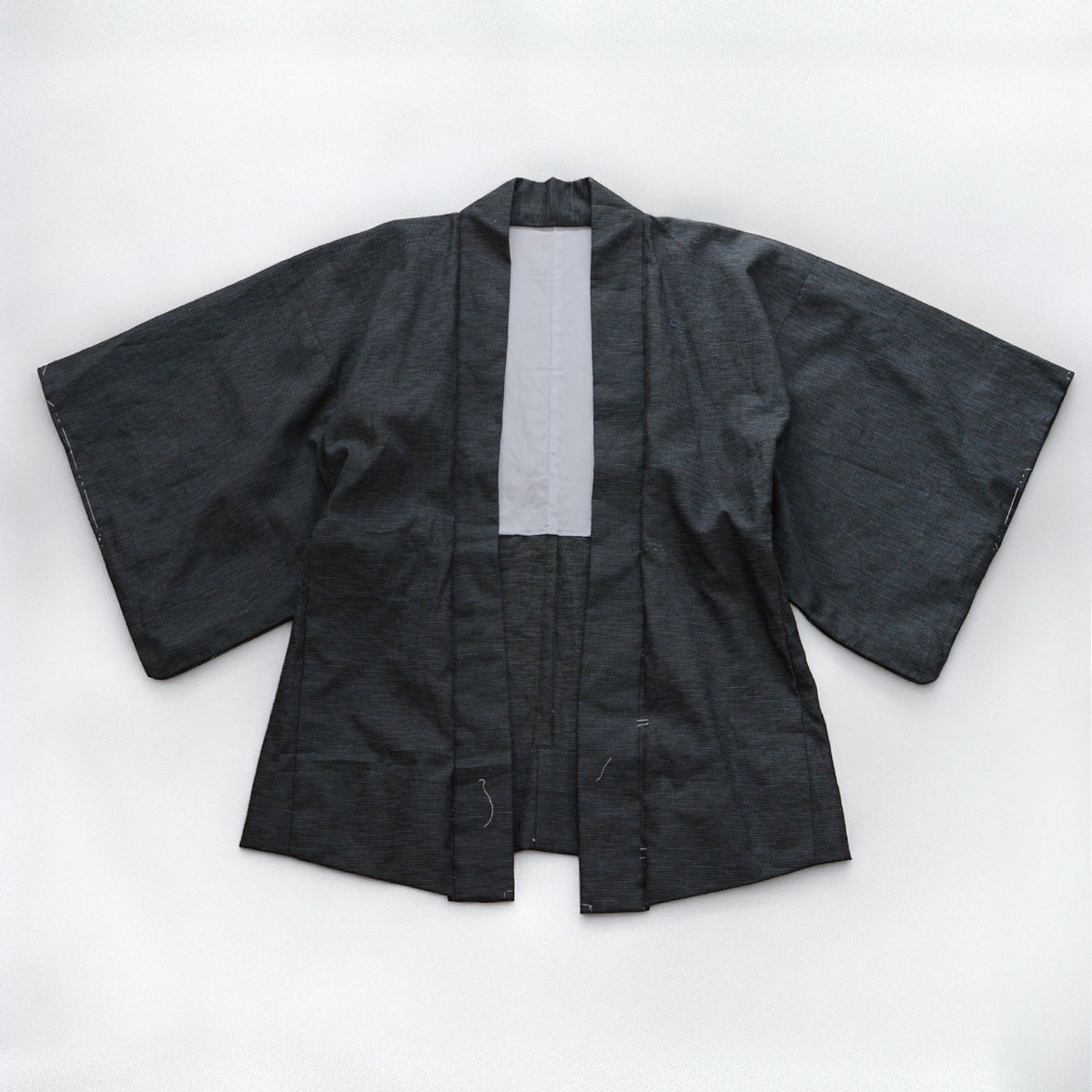 Men's vintage haori jacket in a deep subdued tone, fine slub weave with light grey lining, 1970s-1980s Japan