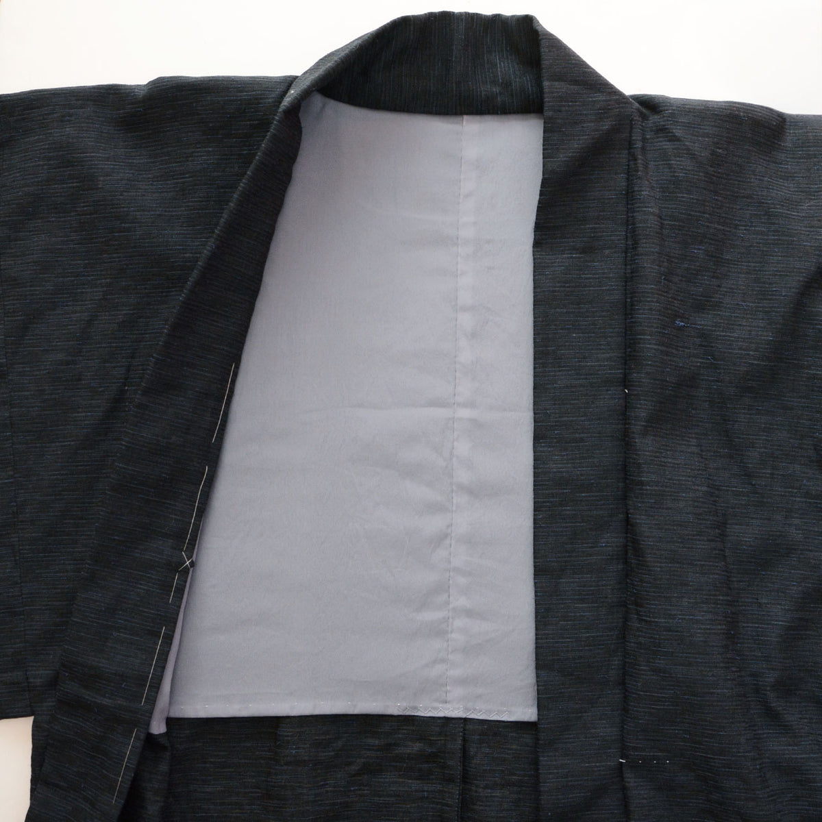 Light grey back lining and collar interior of a men's vintage haori jacket, 1970s-1980s Japan vintage
