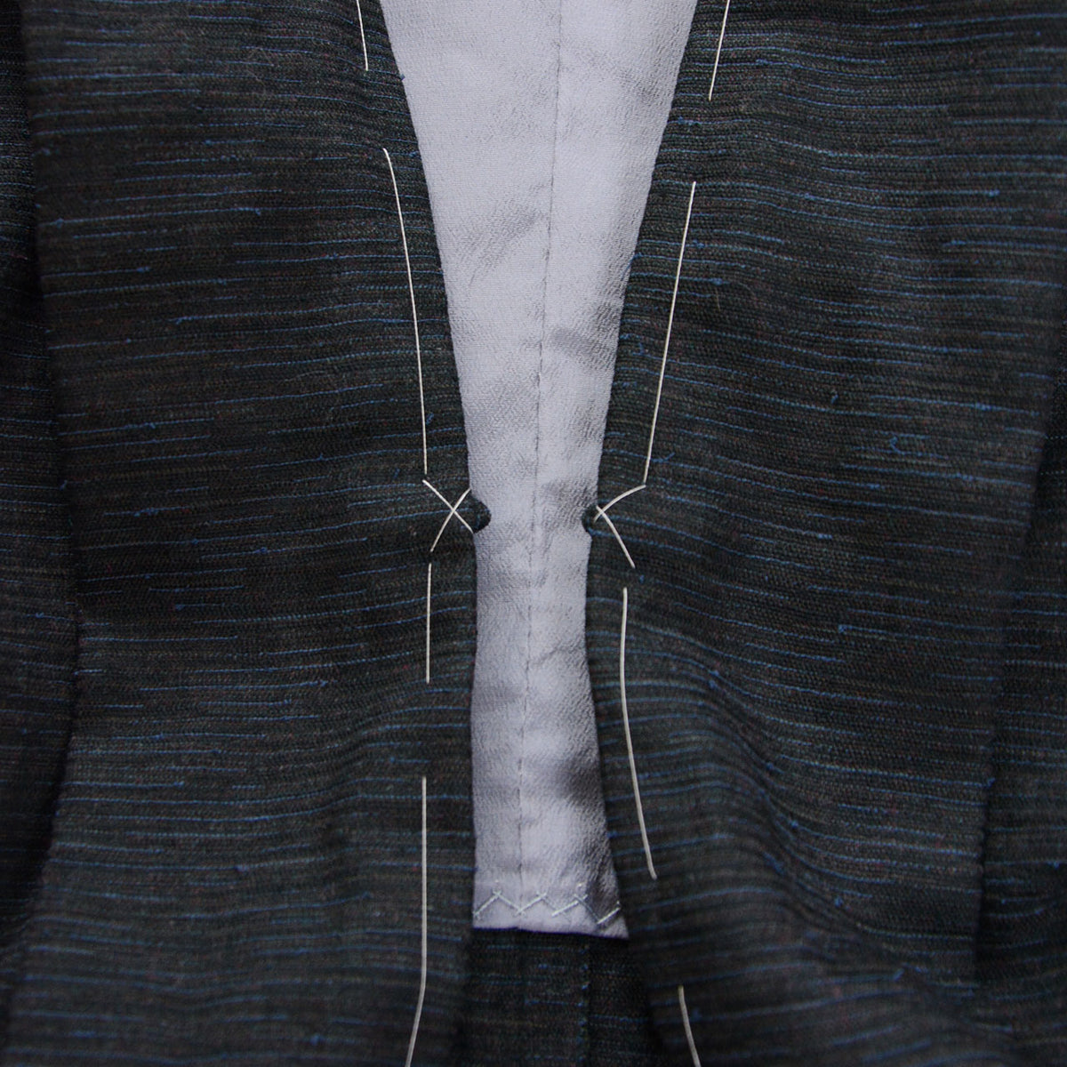 Chi loops for haori himo ties and remaining white basting threads on a men's vintage haori jacket, 1970s-1980s Japan
