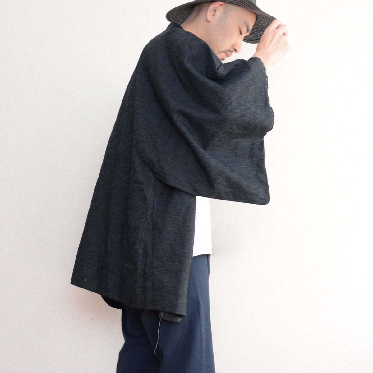 Men's vintage haori jacket worn with a relaxed drape and wide sleeves, 1970s-1980s Japan vintage