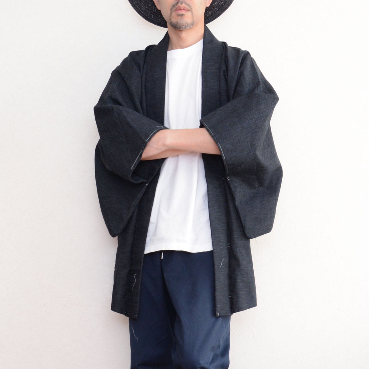 Men's vintage haori jacket in a deep subdued tone worn over a white shirt and trousers, 1970s-1980s Japan vintage