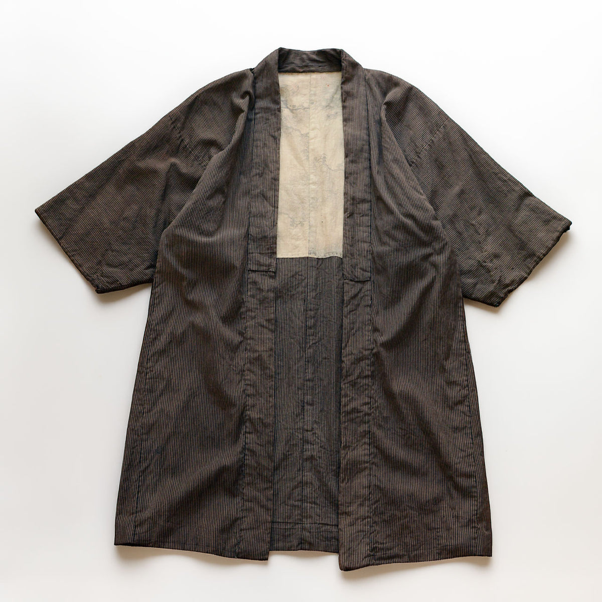 Japanese vintage men's haori jacket in striped cotton, open front showing the lining