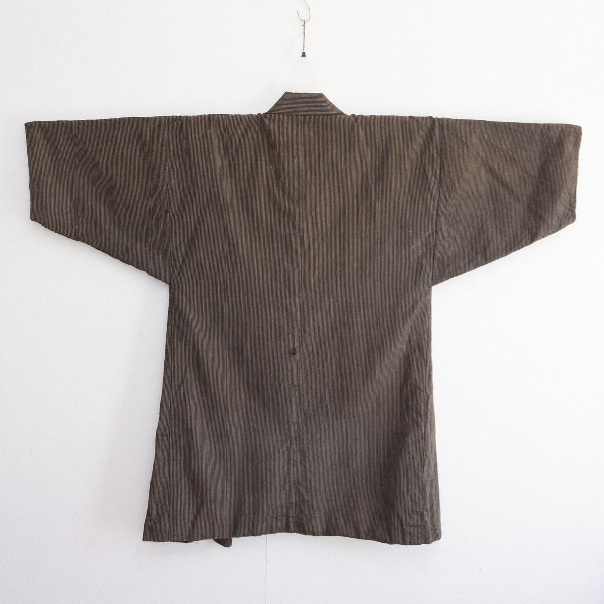 Japanese vintage men's haori jacket with fine striped cotton outer fabric, back view