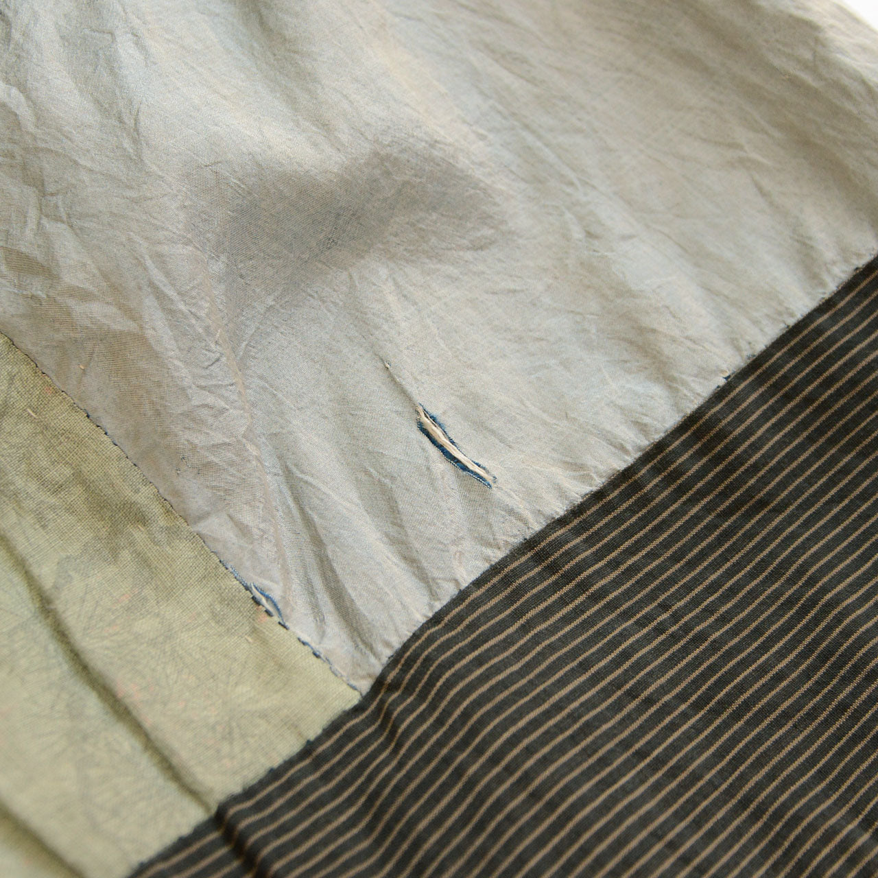 Damage to the acetate-like sleeve lining of a Japanese vintage haori jacket