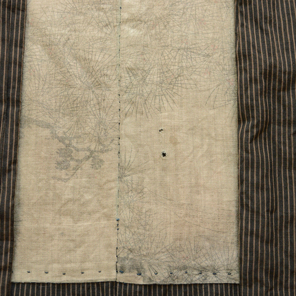 Faded lining motif and damage on a Japanese vintage haori jacket