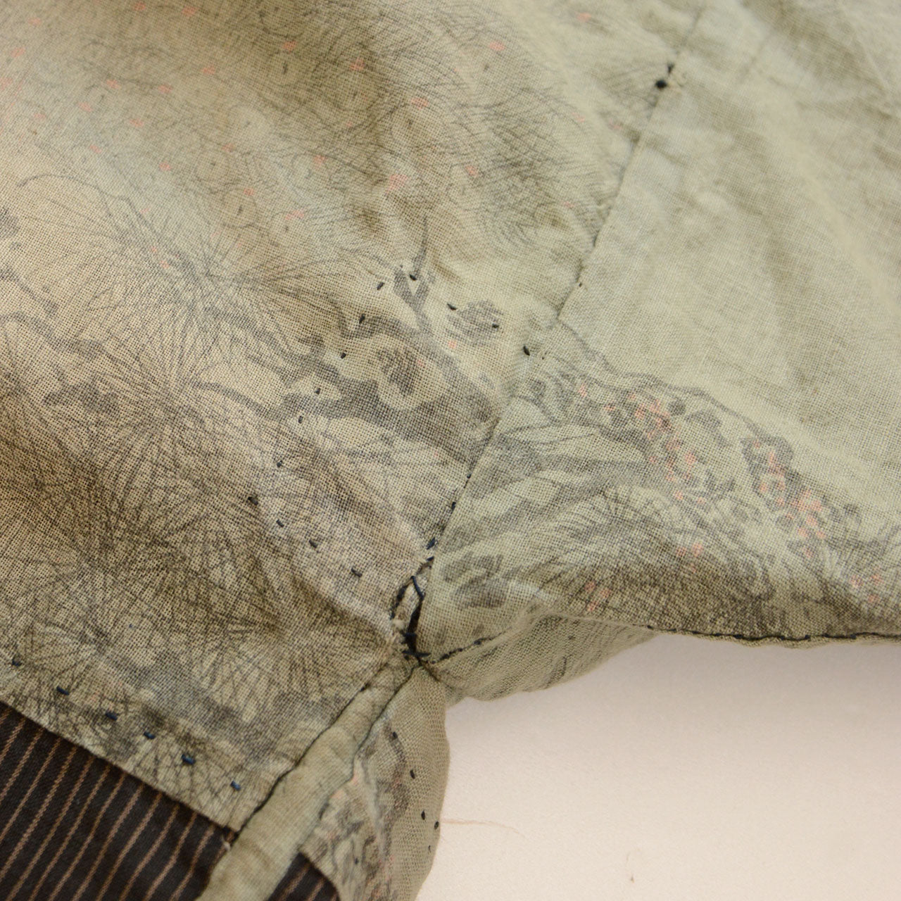 Repair at the underarm on the lining side of a Japanese vintage haori jacket