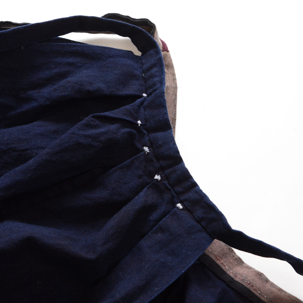Japanese monpe, hand-dyed indigo cotton, gathered hip detail, striped contrast waist ties, Taisho–Showa period