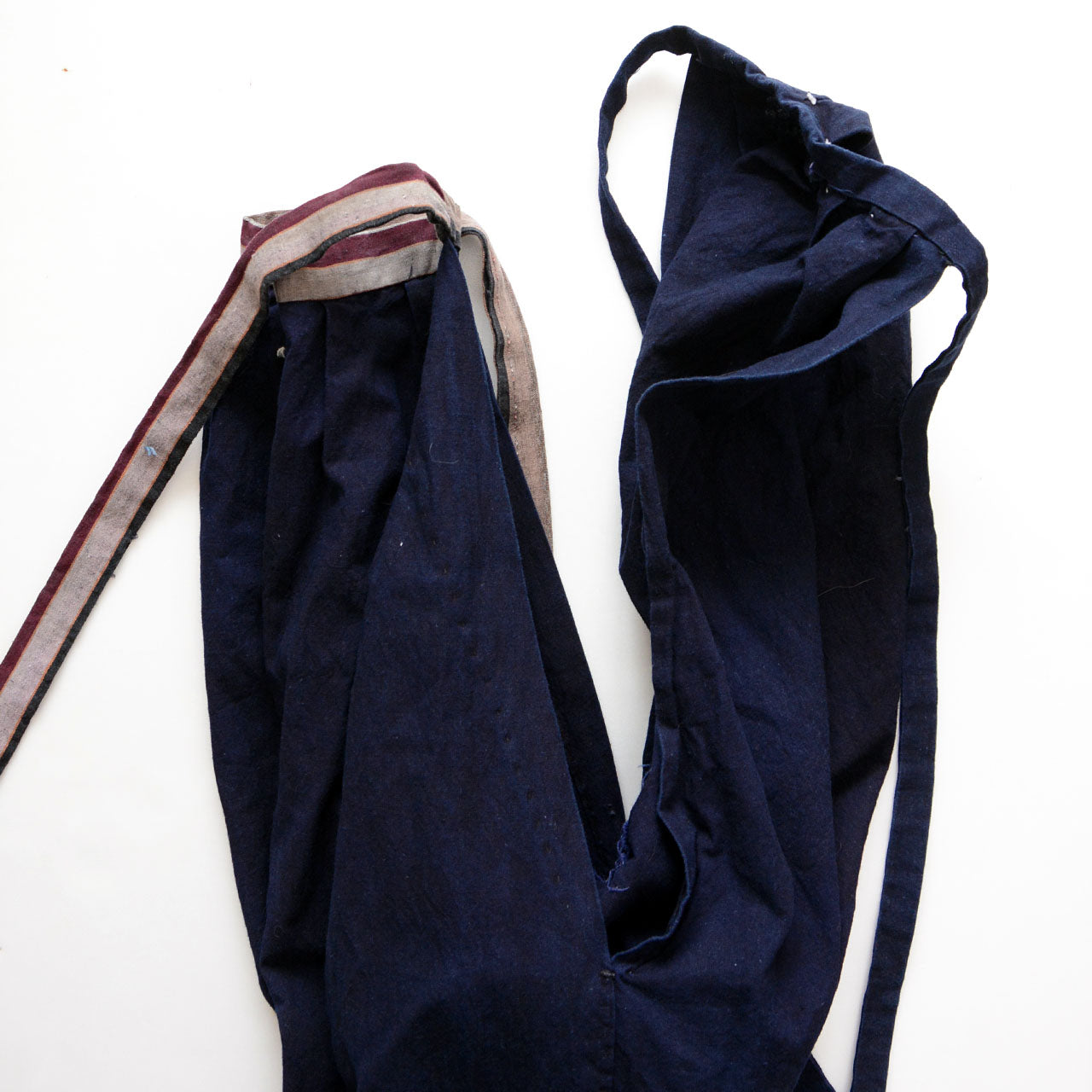 Indigo-dyed cotton monpe, faded aizome textile, vintage Japanese handmade workwear, circa 1910s–1930s