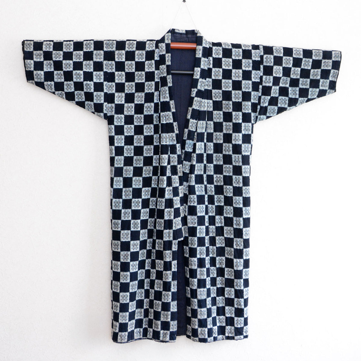 Long indigo cotton hanten jacket with white geometric checkered kasuri design
