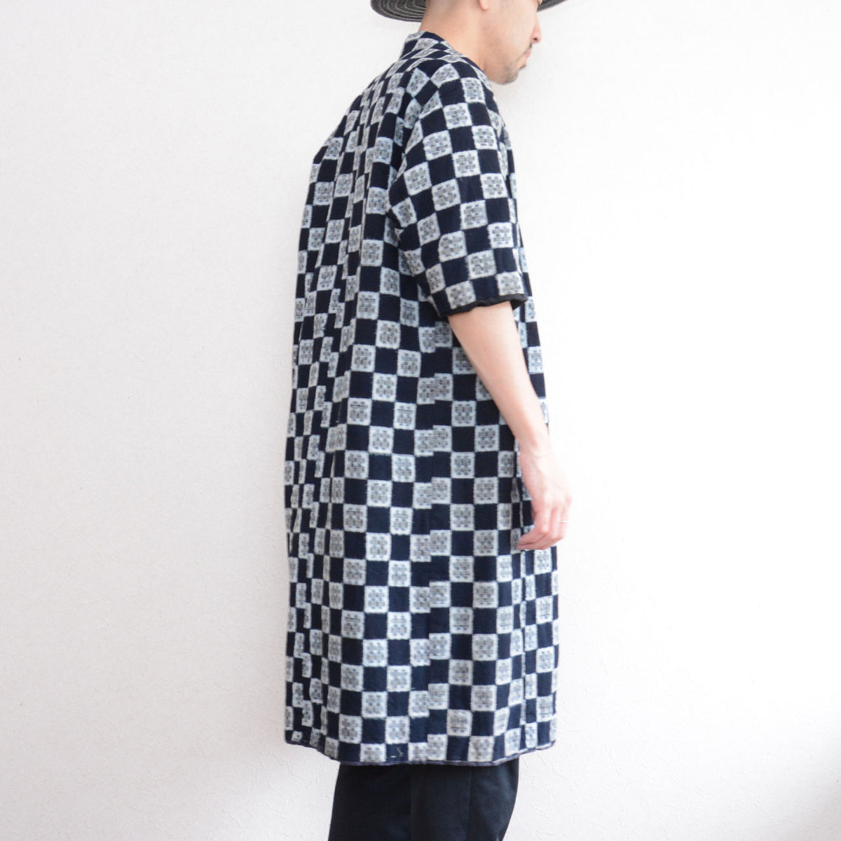 Indigo cotton kasuri padded hanten on a 171 cm model showing its long straight silhouette