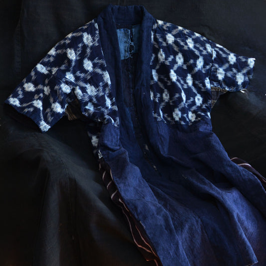 Vintage Japanese noragi jacket made from indigo cotton with sashiko stitching.