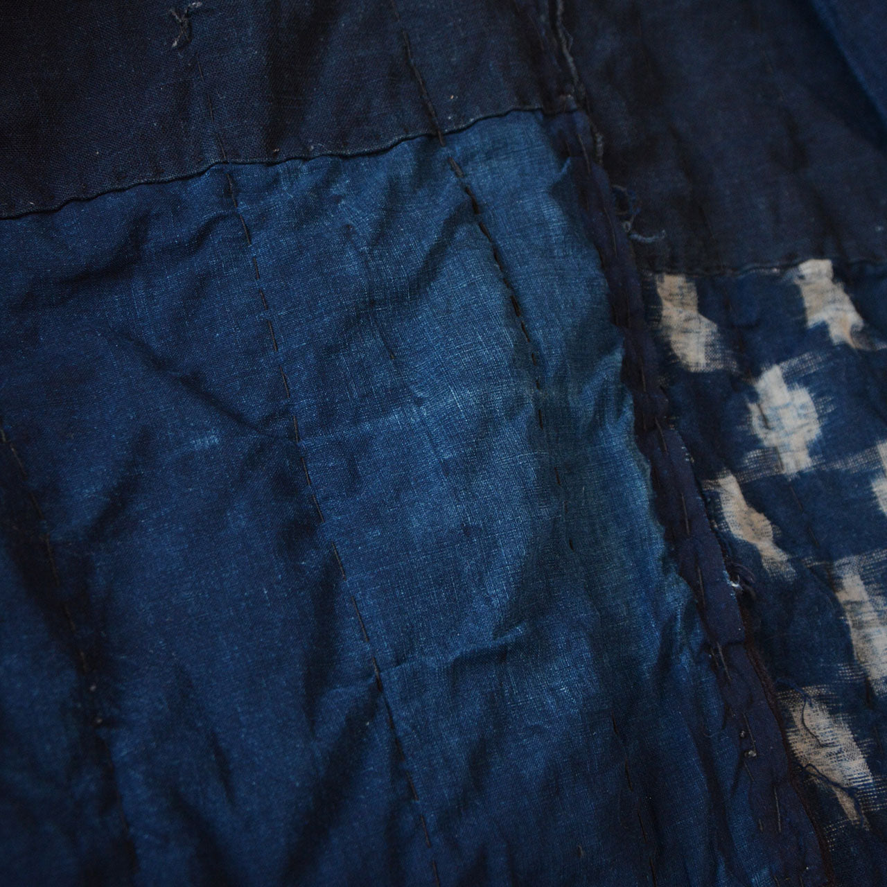 Handcrafted indigo work jacket symbolizing sustainable Japanese culture.
