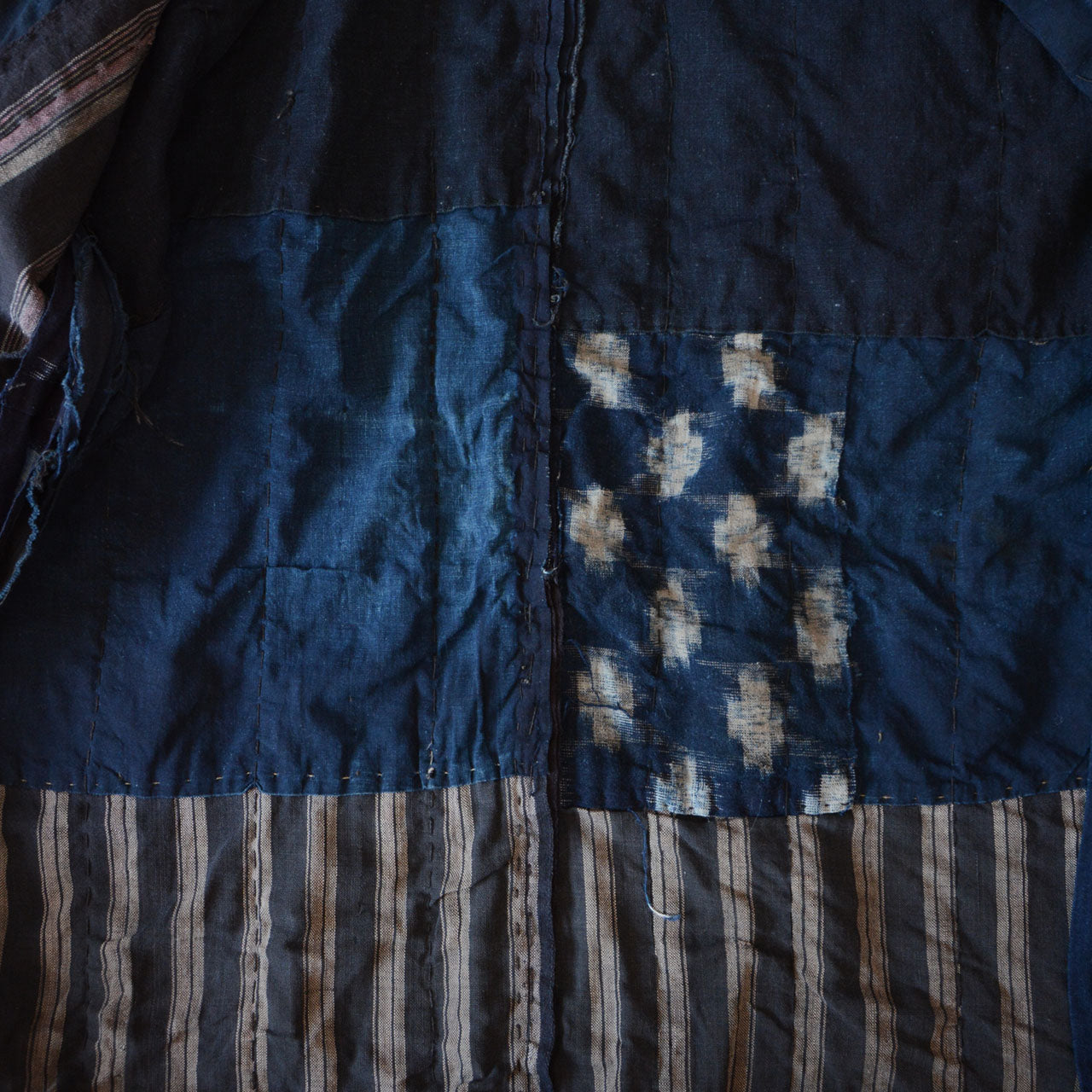 Artistic Japanese patchwork coat with a balance of chaos and harmony.