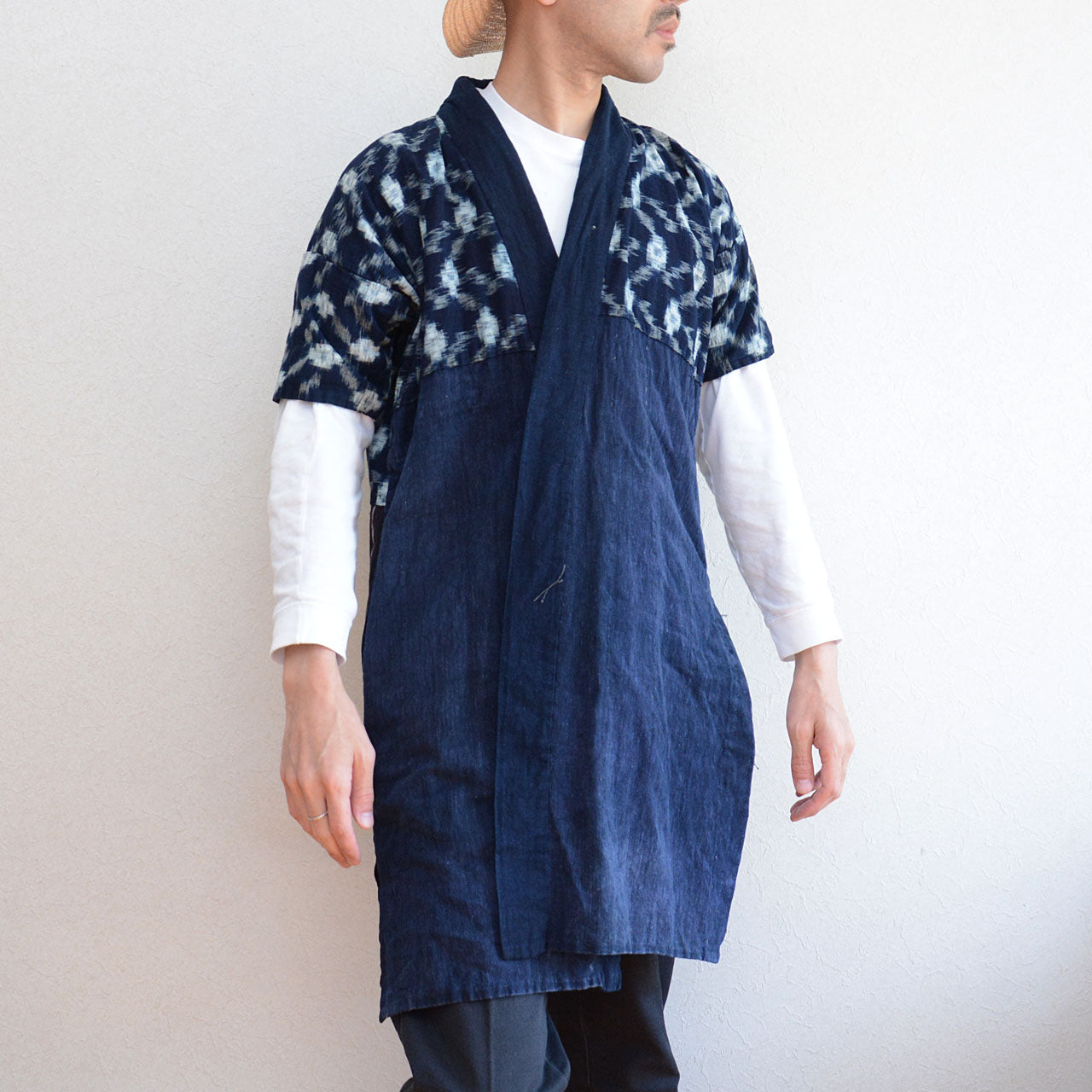 Vintage indigo boro jacket with expressive sashiko hand-stitching.