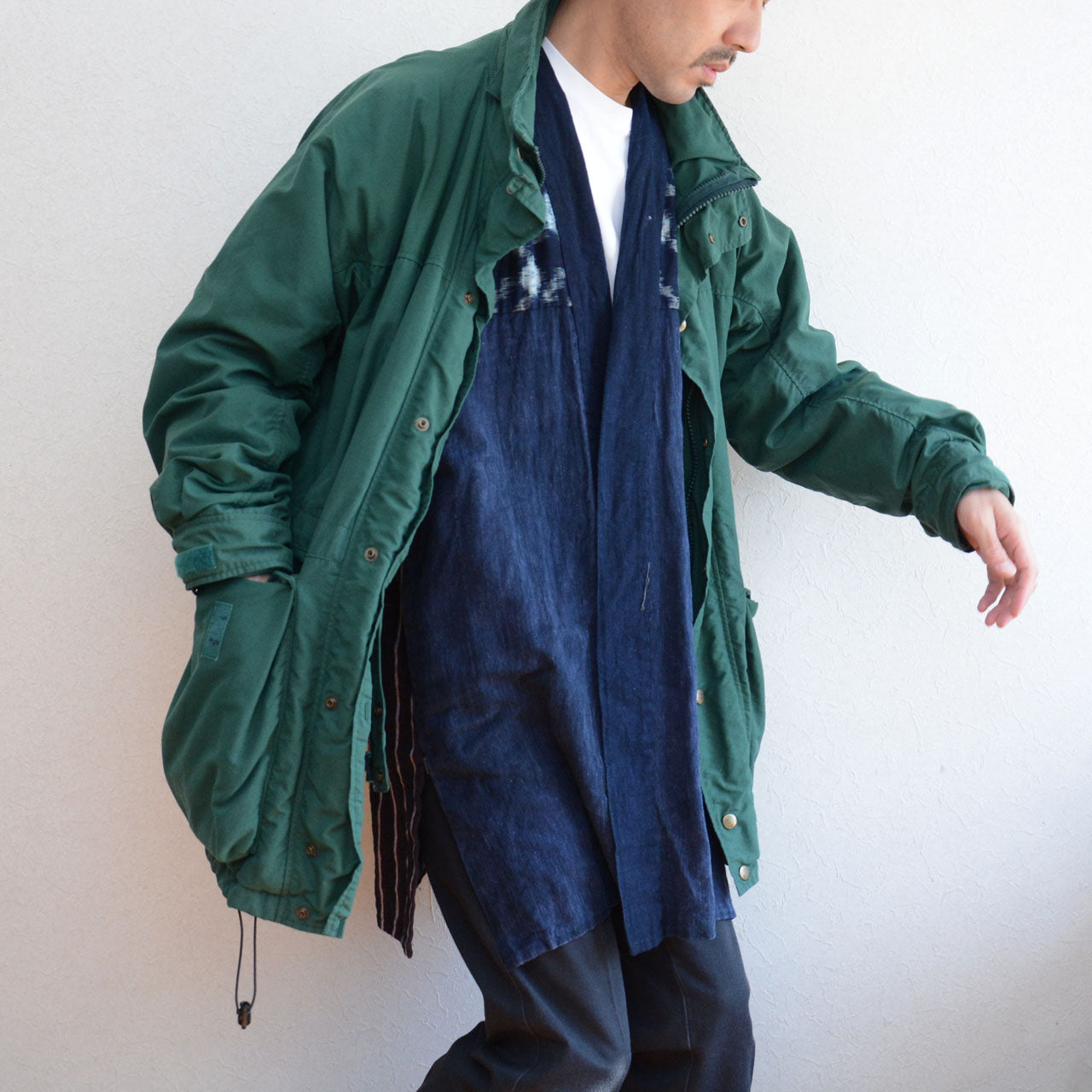 Reconstructed indigo noragi expressing Japan’s handmade textile heritage.